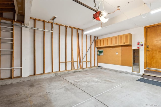 garage featuring a garage door opener