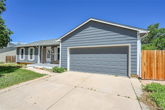 19155 E Kansas Dr, Aurora, CO 80017 - ranch-style home featuring a garage and driveway