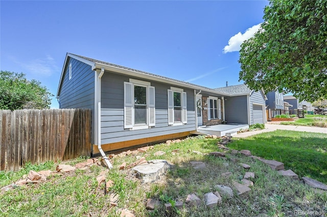 19155 E Kansas Dr, Aurora, CO 80017 - ranch-style house with a garage