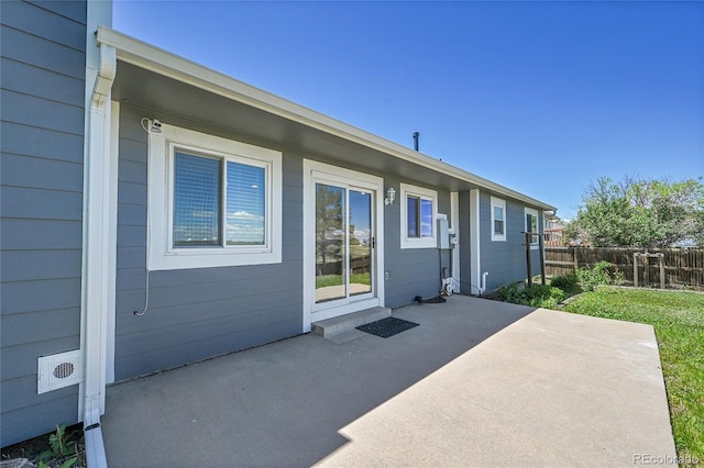 19155 E Kansas Dr, Aurora, CO 80017 - view of exterior entry with a patio