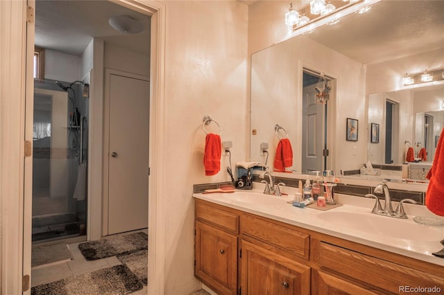 bathroom featuring vanity and tile patterned flooring