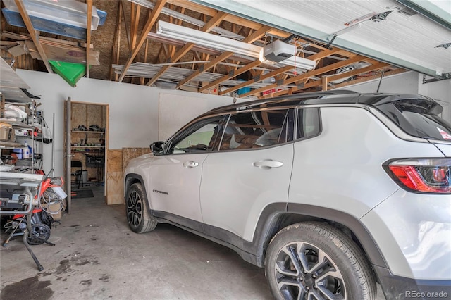 garage featuring a garage door opener