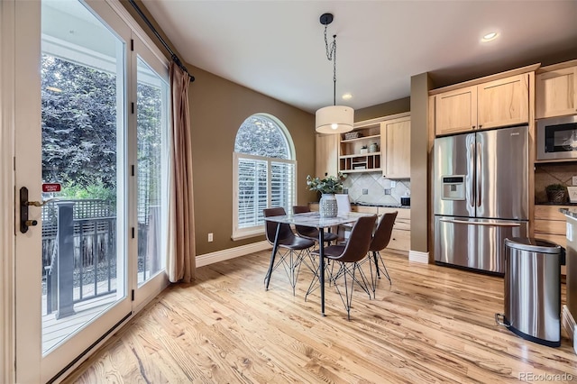 940 Kearney St, Denver, CO 80220 - dining space with light wood-style floors and recessed lighting