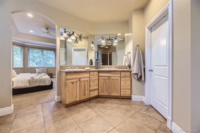 940 Kearney St, Denver, CO 80220 - full bath with double vanity, tile patterned floors, a ceiling fan, a shower, and ensuite bathroom
