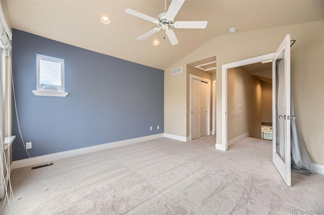 940 Kearney St, Denver, CO 80220 - unfurnished bedroom with lofted ceiling, light carpet, recessed lighting, a ceiling fan, and a closet