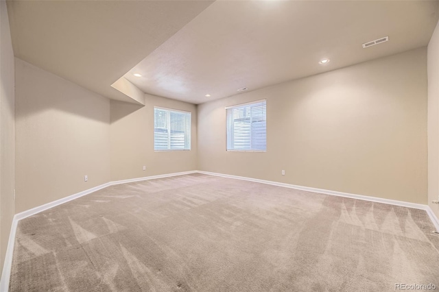 940 Kearney St, Denver, CO 80220 - carpeted empty room with baseboards and recessed lighting
