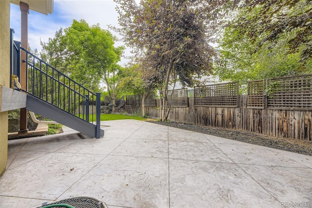 940 Kearney St, Denver, CO 80220 - fenced backyard with a patio area and stairs
