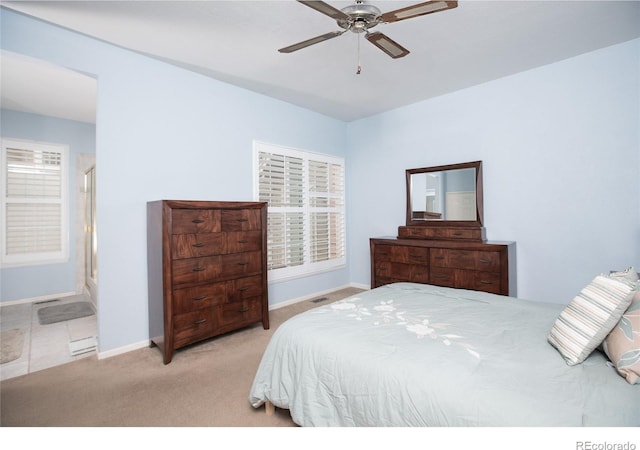 9864 Carmel Ct, Lone Tree, CO 80124 - bedroom with multiple windows, carpet flooring, a ceiling fan, and ensuite bath