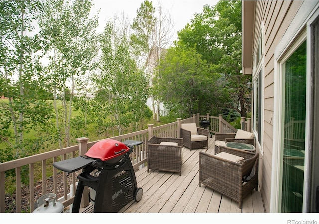 9864 Carmel Ct, Lone Tree, CO 80124 - wooden deck featuring a grill, an outdoor living space, and view of scattered trees