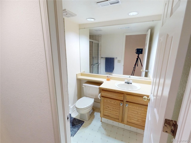 9864 Carmel Ct, Lone Tree, CO 80124 - full bathroom with tile patterned floors, vanity, an enclosed shower, and recessed lighting