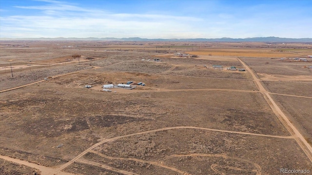 aerial view featuring a mountain view and a rural view