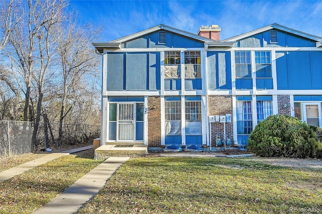 view of front of house with a front yard