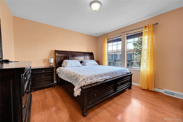 bedroom featuring light hardwood / wood-style floors