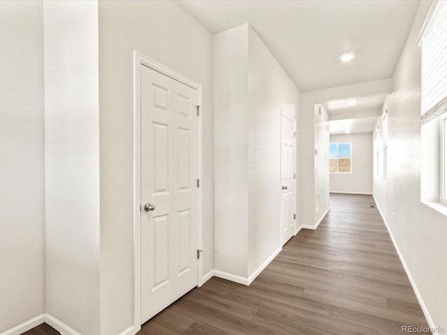 hallway featuring dark hardwood / wood-style floors