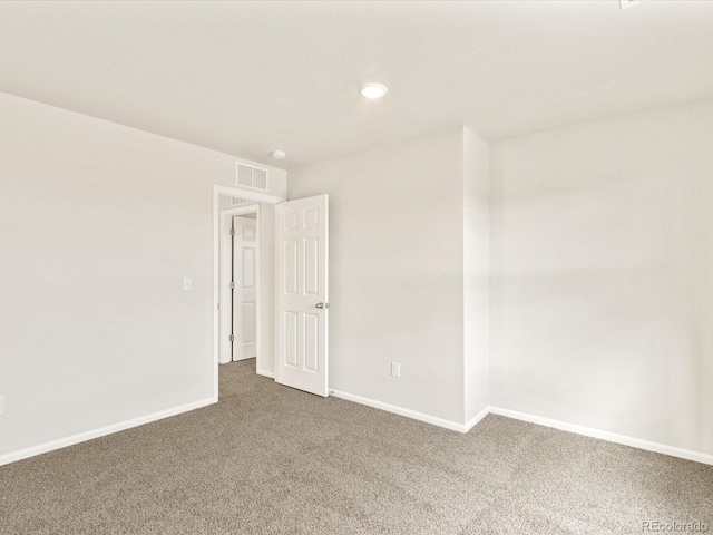 unfurnished room featuring carpet floors