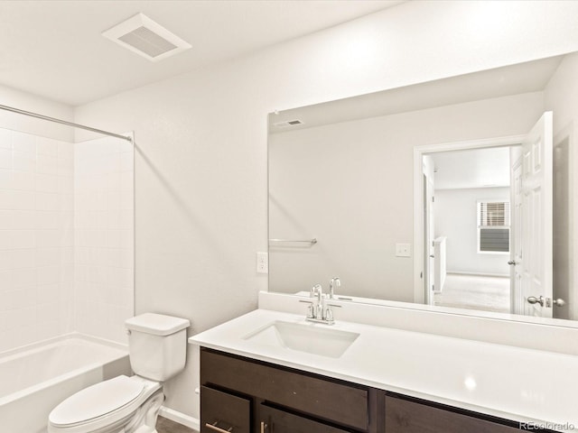 full bathroom with washtub / shower combination, toilet, and vanity