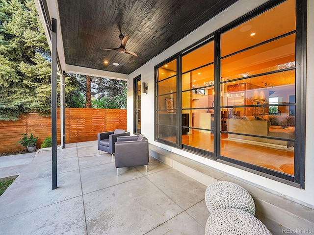 view of patio with ceiling fan