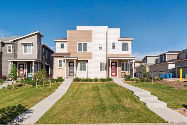 view of front of house featuring a front lawn and a residential view