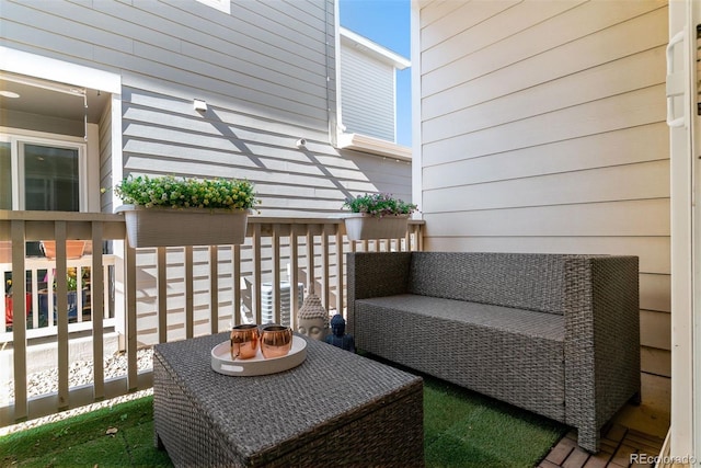 balcony with an outdoor hangout area