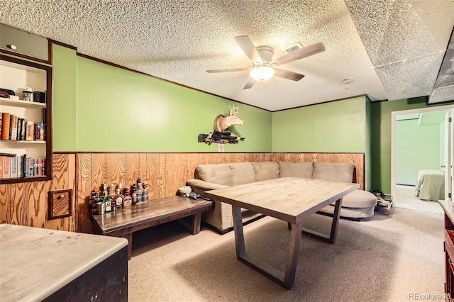 11816 Spring Dr, Northglenn, CO 80233 - interior space with a ceiling fan, wainscoting, and wooden walls