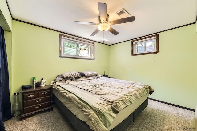 11816 Spring Dr, Northglenn, CO 80233 - bedroom featuring multiple windows, carpet flooring, crown molding, a ceiling fan, and baseboards