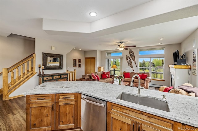131 Creek Ln, Silverthorne, CO 80498 - kitchen with dishwasher, open floor plan, light stone counters, and recessed lighting