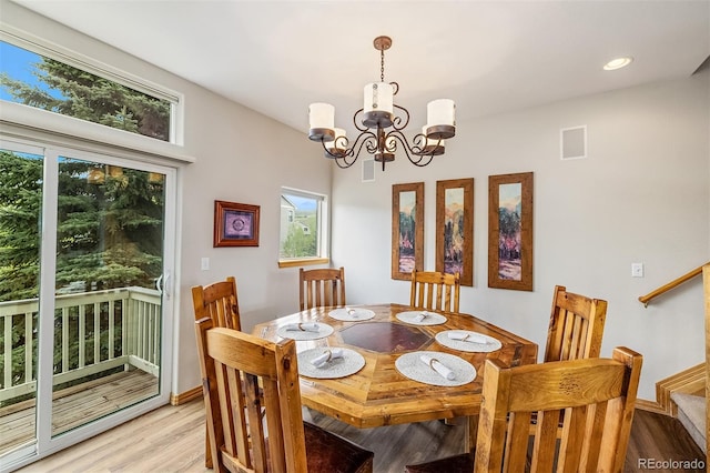 131 Creek Ln, Silverthorne, CO 80498 - dining room with a chandelier, light wood-style flooring, and recessed lighting