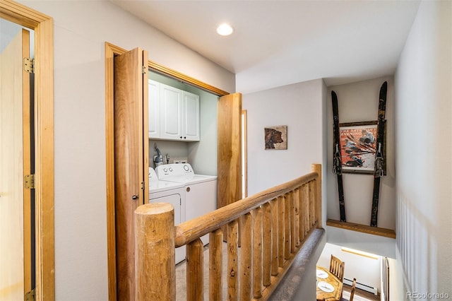 131 Creek Ln, Silverthorne, CO 80498 - corridor with separate washer and dryer, a baseboard radiator, and recessed lighting