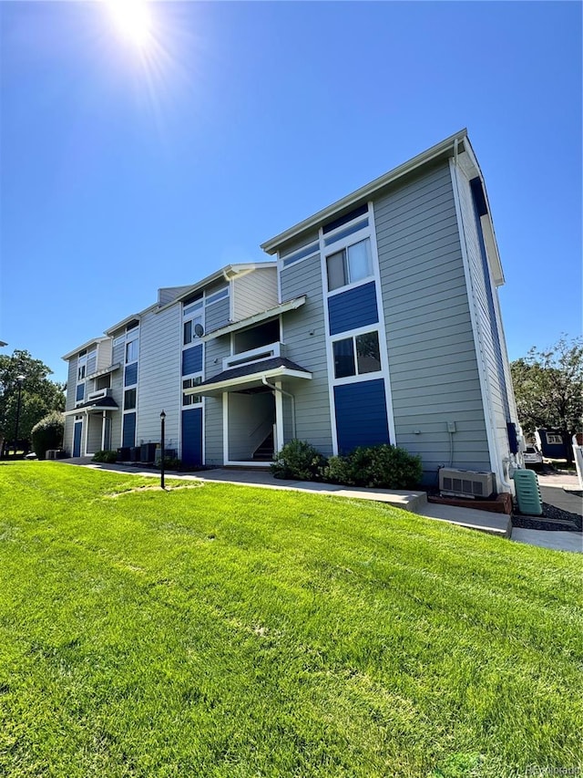 view of building exterior with cooling unit