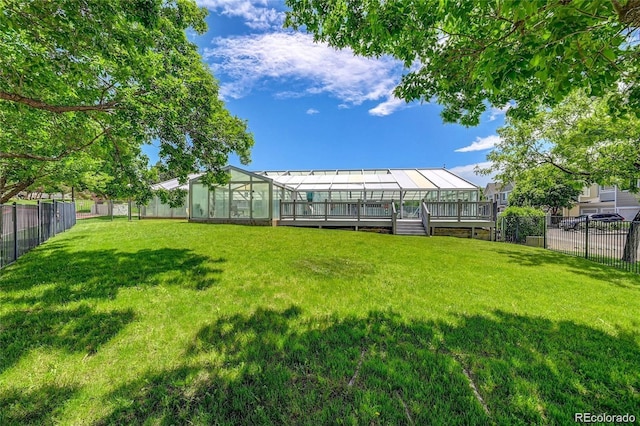 view of yard featuring a wooden deck