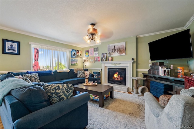 22379 E Dorado Ave, Aurora, CO 80015 - living room with ornamental molding, ceiling fan, and a fireplace