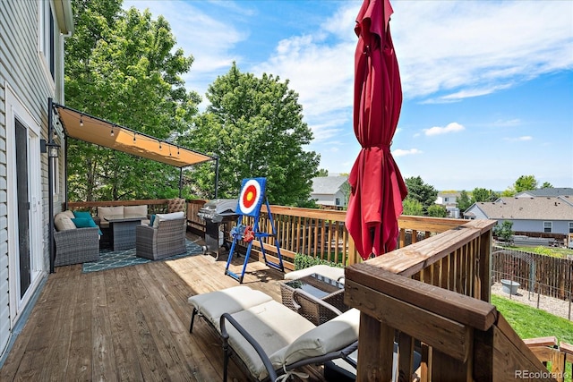 22379 E Dorado Ave, Aurora, CO 80015 - wooden deck featuring an outdoor living space and area for grilling
