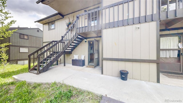 144 Tall Pine Cir, Grand Lake, CO 80447 - back of house with stairway and a patio