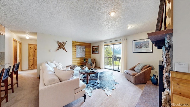 144 Tall Pine Cir, Grand Lake, CO 80447 - living room featuring light carpet and a textured ceiling