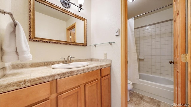 144 Tall Pine Cir, Grand Lake, CO 80447 - full bathroom with vanity, toilet, and shower / bath combo with shower curtain