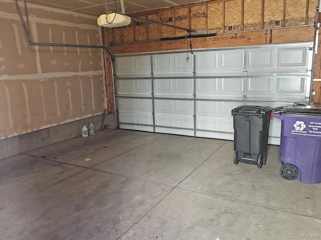 garage featuring a garage door opener