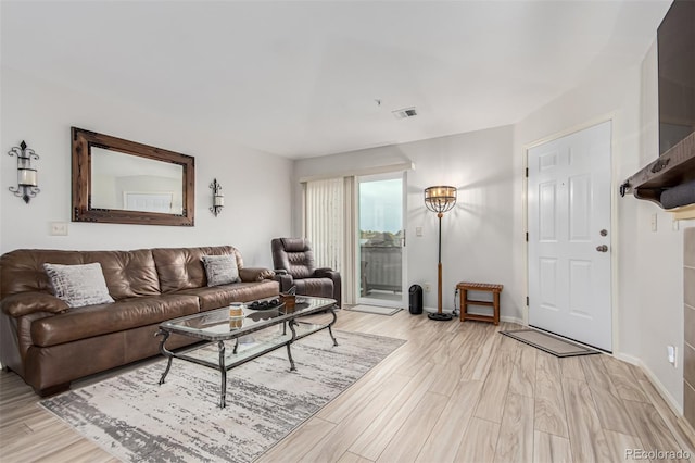 living room featuring light hardwood / wood-style floors