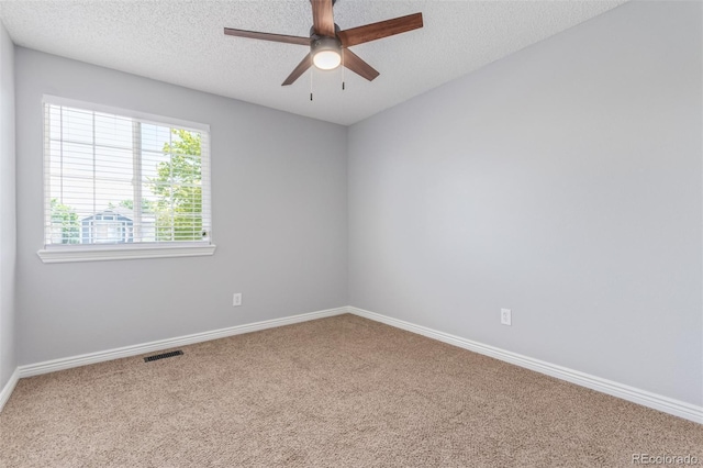 4935 Apollo Bay Dr, Highlands Ranch, CO 80130 - carpeted spare room featuring ceiling fan, baseboards, and a textured ceiling