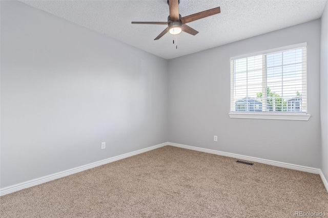 4935 Apollo Bay Dr, Highlands Ranch, CO 80130 - unfurnished room with carpet, ceiling fan, a textured ceiling, and baseboards