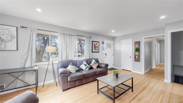 living room featuring light wood-type flooring