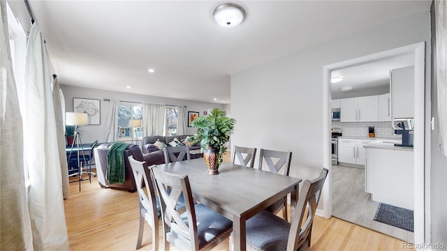 dining room featuring light hardwood / wood-style flooring