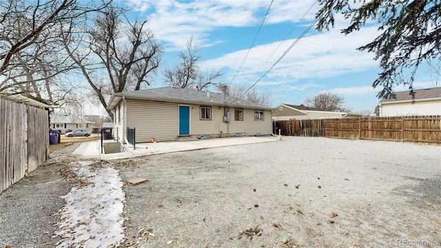 rear view of house featuring a patio