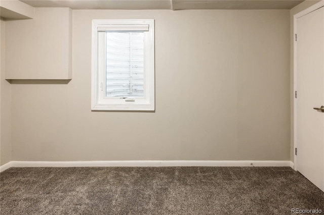 654 S Shoshone St, Denver, CO 80223 - carpeted empty room featuring baseboards