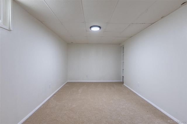 3256 S Nucla St, Aurora, CO 80013 - empty room featuring carpet floors, a paneled ceiling, and baseboards