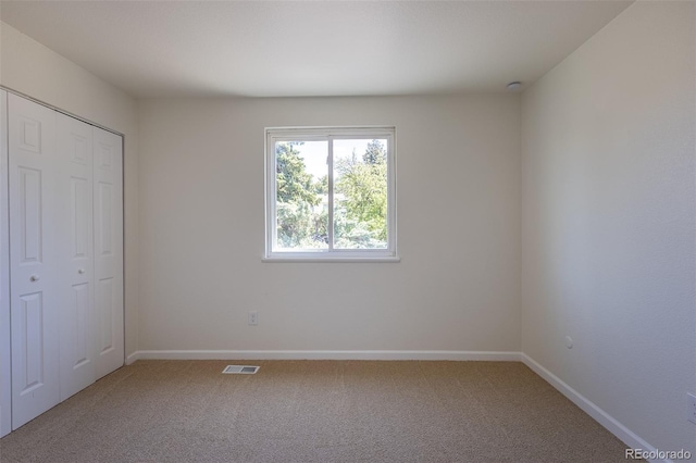 3256 S Nucla St, Aurora, CO 80013 - unfurnished bedroom with carpet floors, baseboards, and a closet