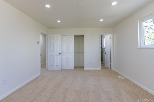 3256 S Nucla St, Aurora, CO 80013 - unfurnished bedroom with recessed lighting, light carpet, and baseboards