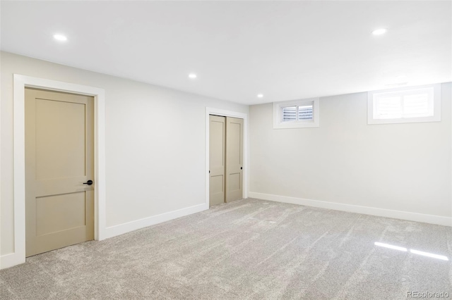 basement featuring carpet floors, recessed lighting, and baseboards