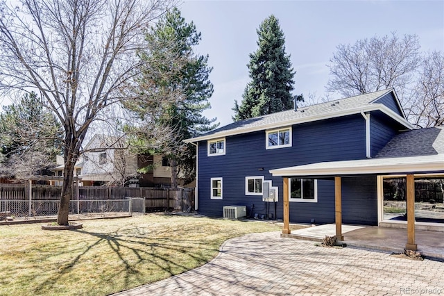 back of house with a patio area and central AC unit