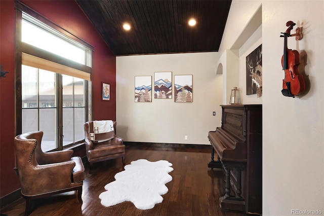 living area with recessed lighting, wooden ceiling, baseboards, and wood finished floors