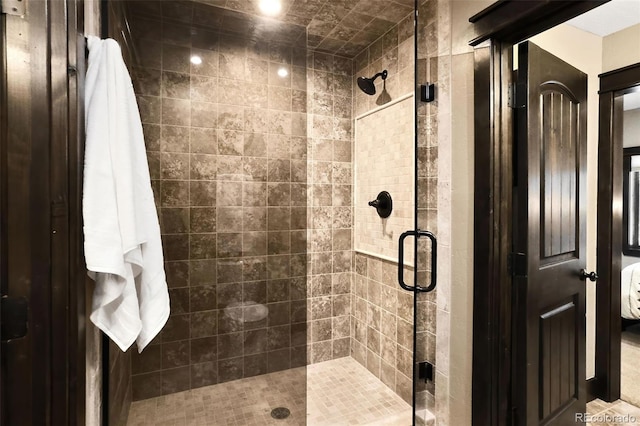 bathroom featuring a shower stall